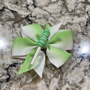Girls green and white alligator hair clip with green white swirl lollipop charm